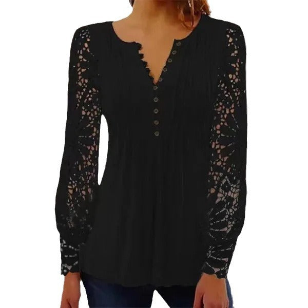 Damer spidsbluse med elegante knapdetaljer og voluminøse ærmer Stilla