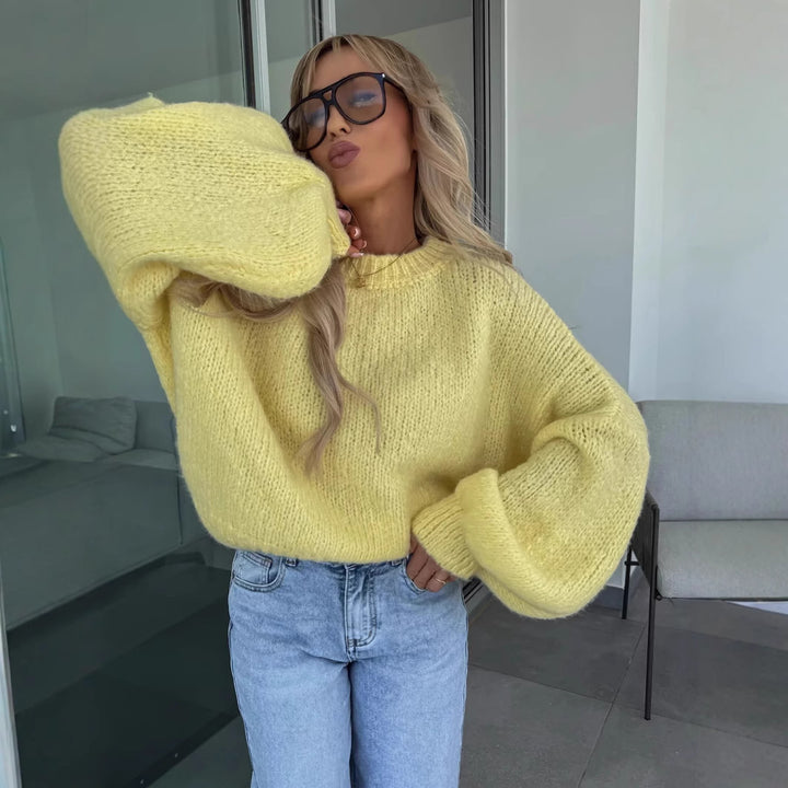 Kvinders oversized strikket sweater med voluminøse ærmer og moderne design Stilla