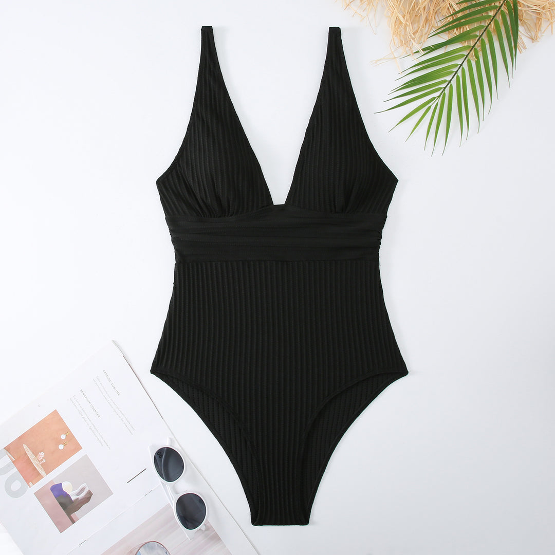 Dame once-piece badedragt med dyb V-hals og struktureret rib-look Skovae
