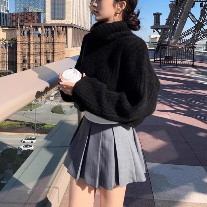 Damers fashionable rullehals sweater med ribstrikket struktur og løs pasform Stilla