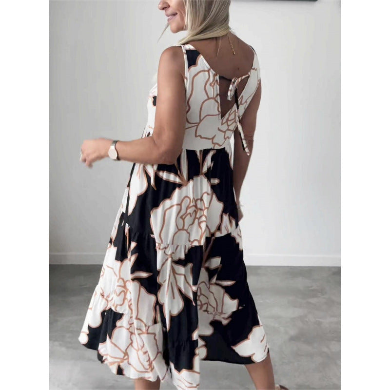 Dame Maxikjole med floral design og asymmetrisk kant Stilla