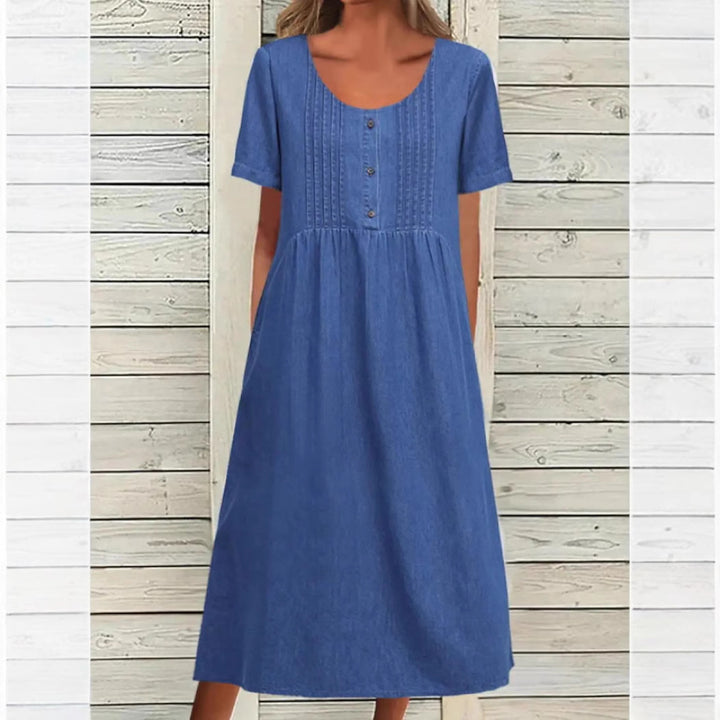Dame nan locker siddende Midikjole i Denim-look med Rundhalsudskæring, brystfalsker og sidelommer Skovae