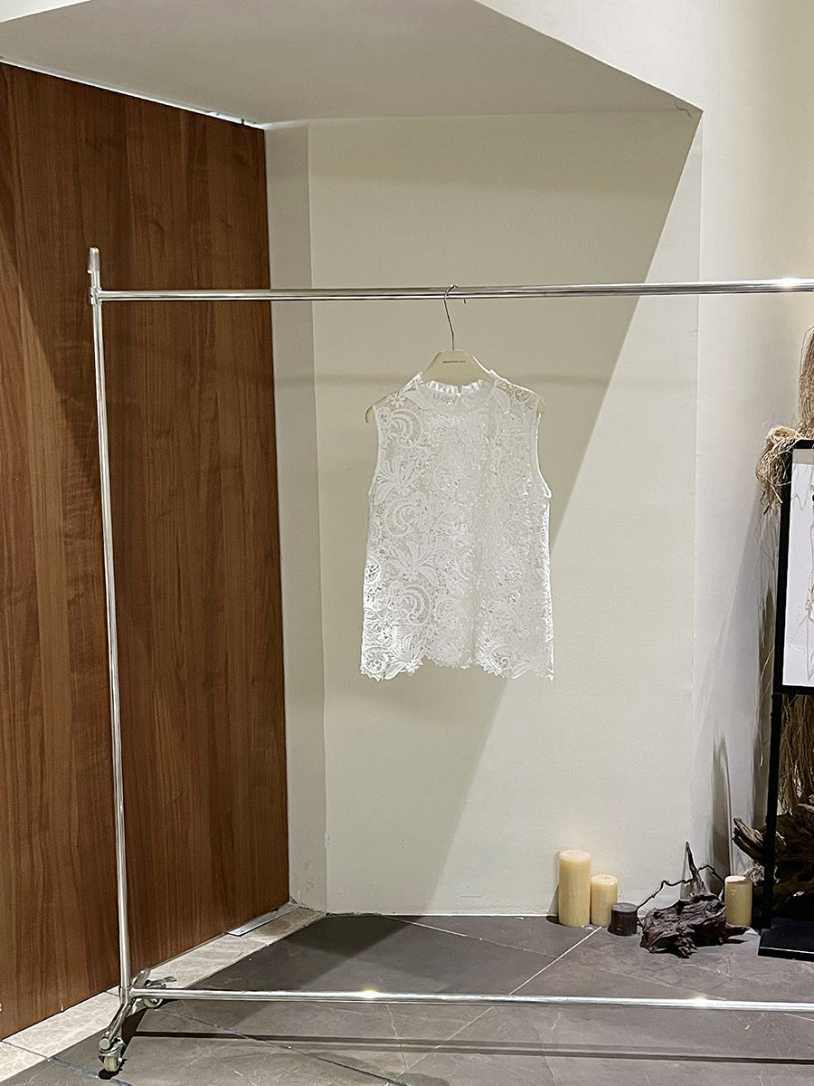 Dame spids top med elegant snit og fine detaljer Stilla