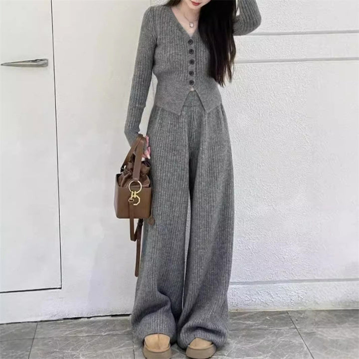 Kvinders strikket jumpsuit med knapdetaljer og afslappet pasform Stilla