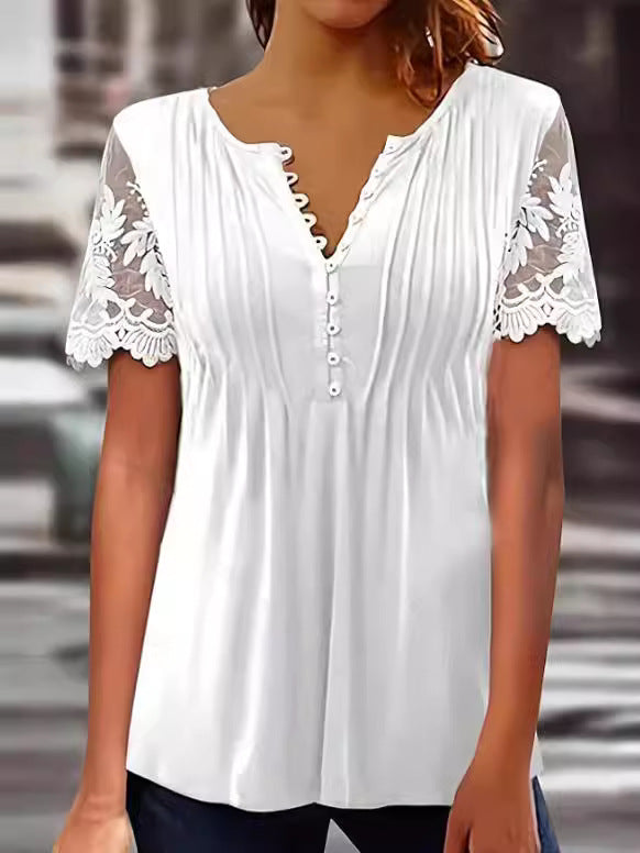 Damebluse med spidse detaljer og plissering Stilla