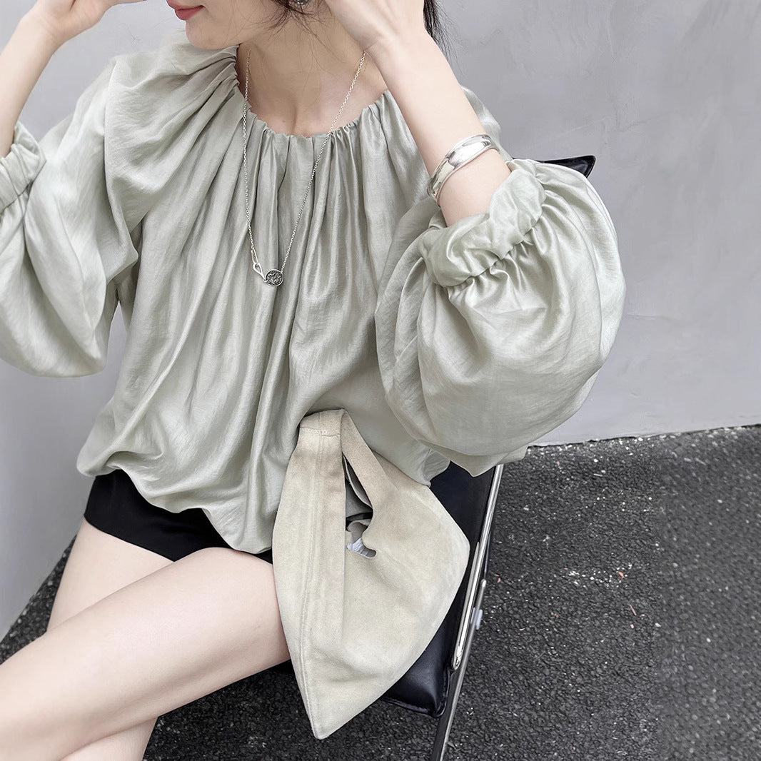 Dame elegant bluse med puffærmer og skinnende finish Stilla
