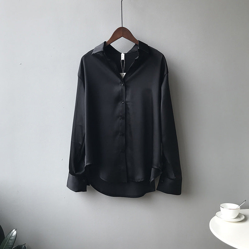 Dame silkebluse med elegante knapdetaljer Stilla