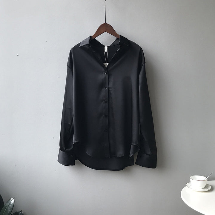 Dame silkebluse med elegante knapdetaljer Stilla