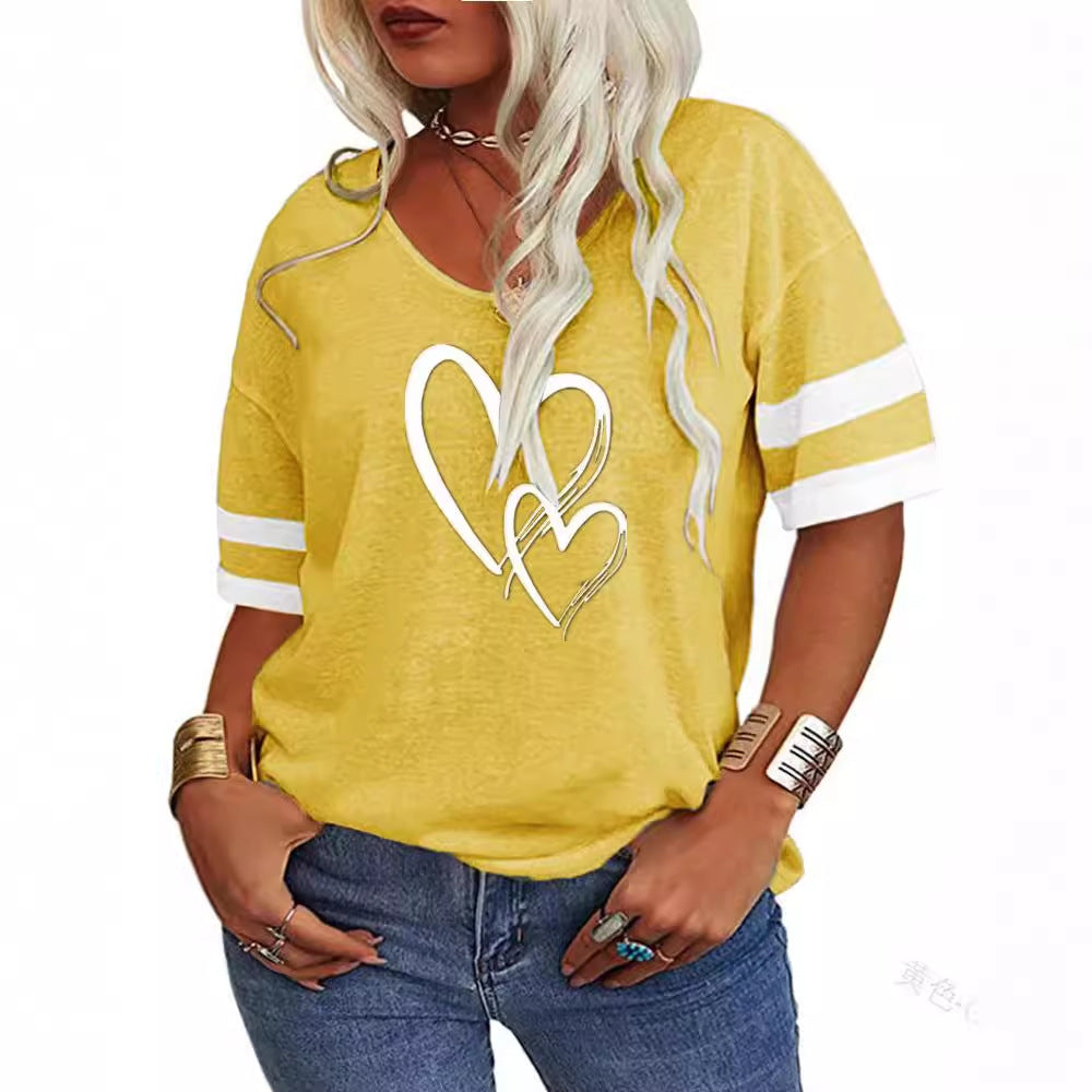 Damer afslappet T-shirt med kreativt hjerte design og sporty ærmer Stilla