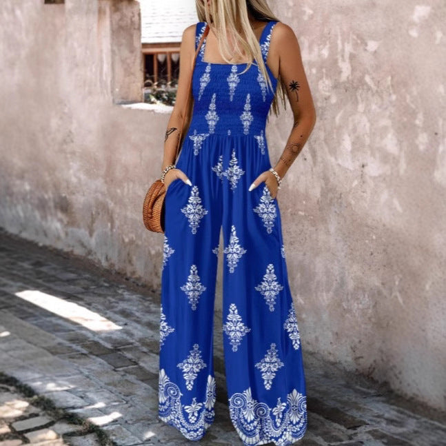 Dame jumpsuit med elastisk taljebånd og blomsterdekorationer Skovae