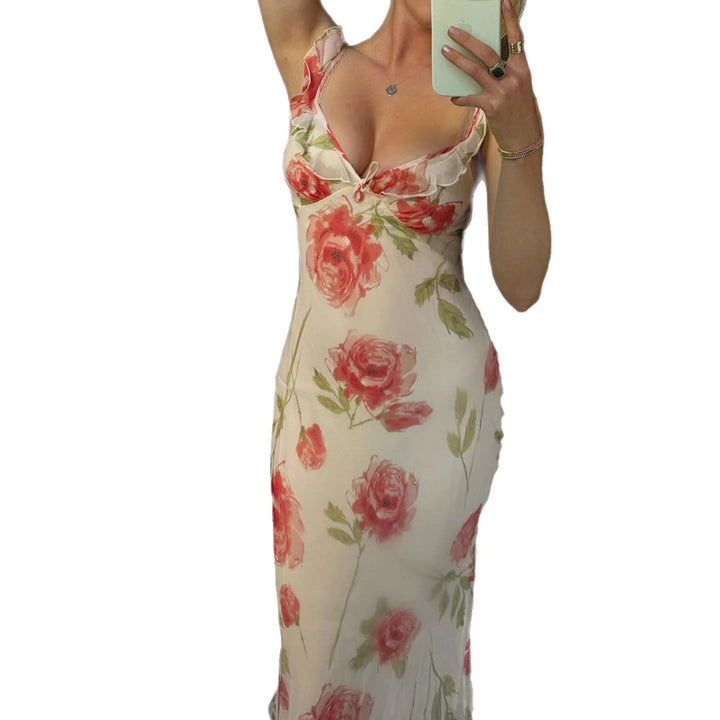 Dame maxikjole med blomster cut-out og fine spaghetti stropper Skovae