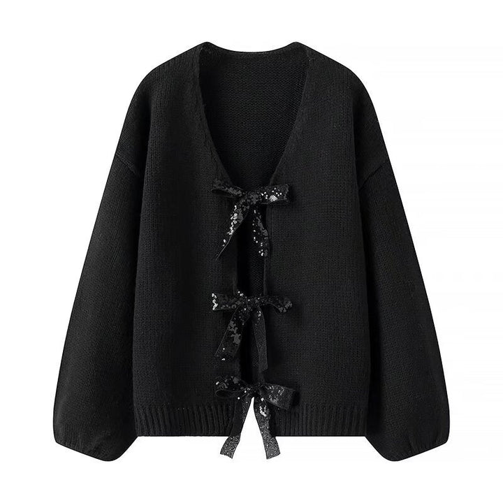 Kvindernes løse strikket cardigan med elegante bånddetaljer Stilla