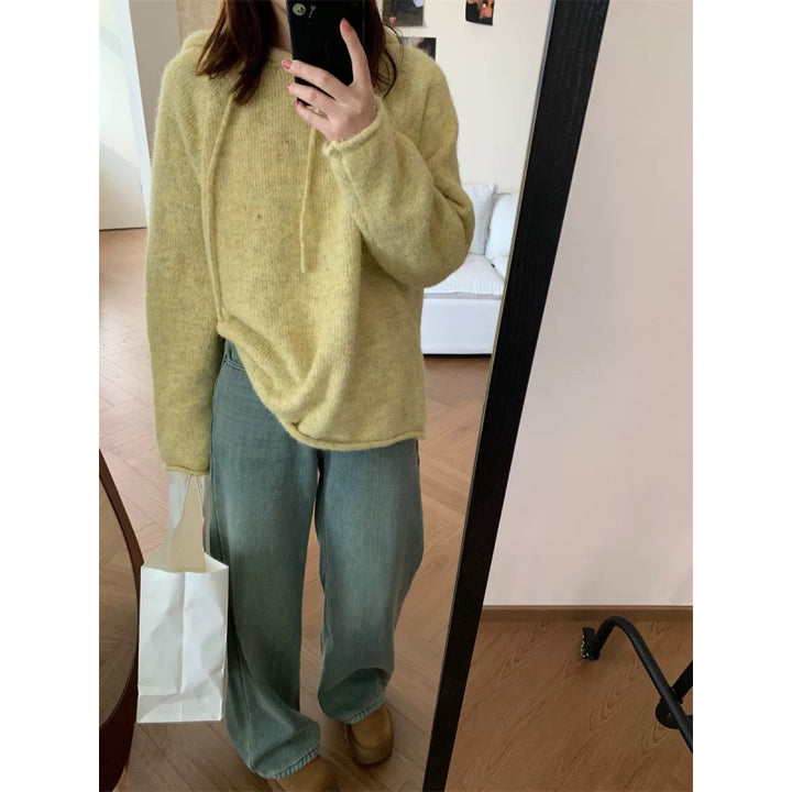 Kvinders hyggelige hætte sweatshirt lavet af blødt fleece-materiale med kengurulomme Stilla