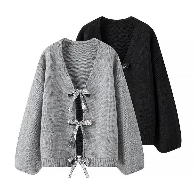 Kvindernes løse strikket cardigan med elegante bånddetaljer Stilla