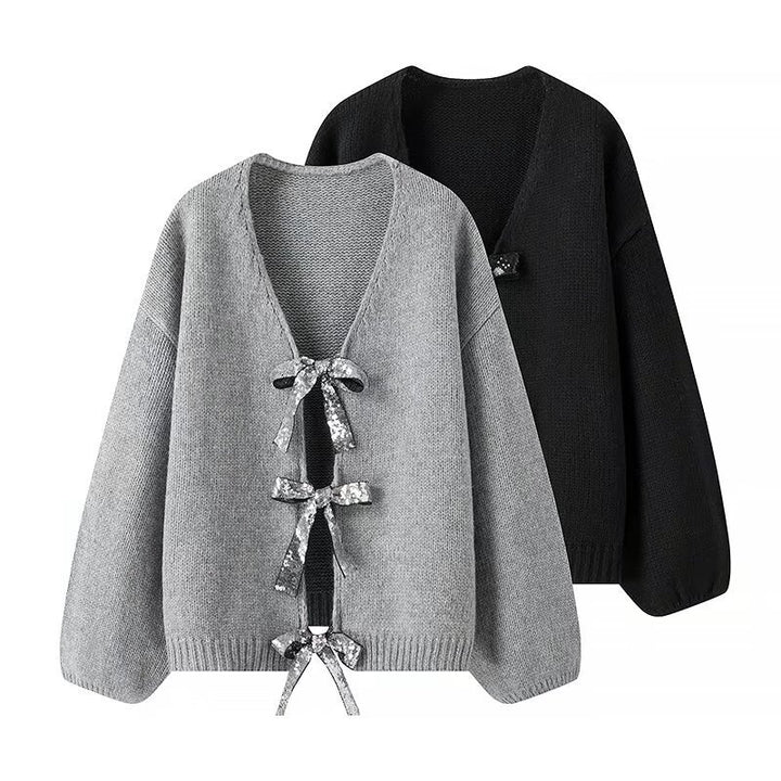 Kvindernes løse strikket cardigan med elegante bånddetaljer Stilla