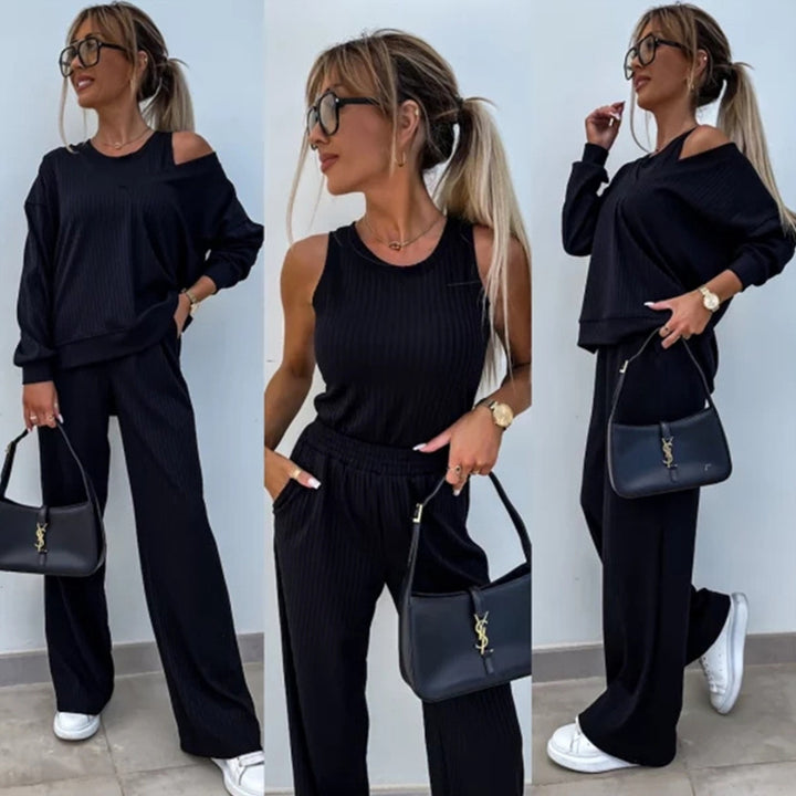 Kvinders afslappede outfit med sideåbninger og bred pasform