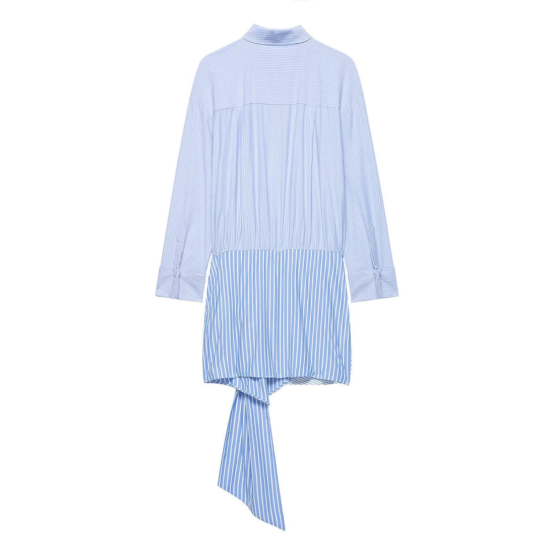 Damebluse med asymmetrisk knude og raffineret drapering Skovae