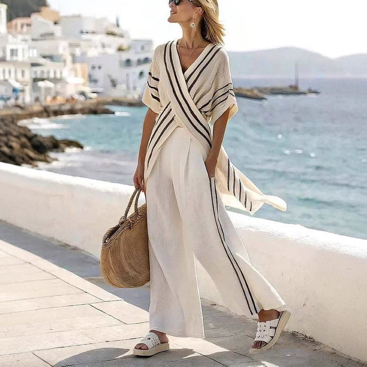 Dame nan resort-inspireret sæt med krydset kimono-tunika og højt skåret palazzo-bukser Skovae