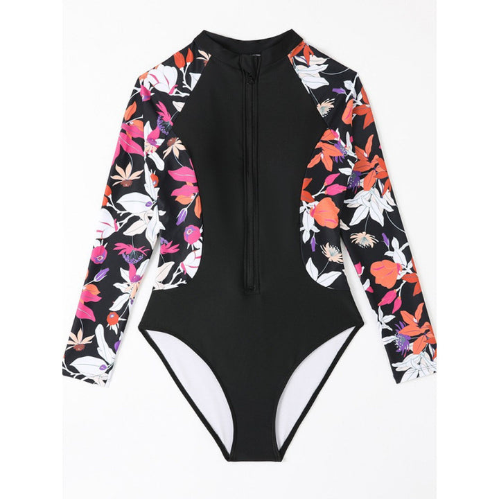 Dame surfdragt med blomsterfarvet design og sportslig lynlås Skovae