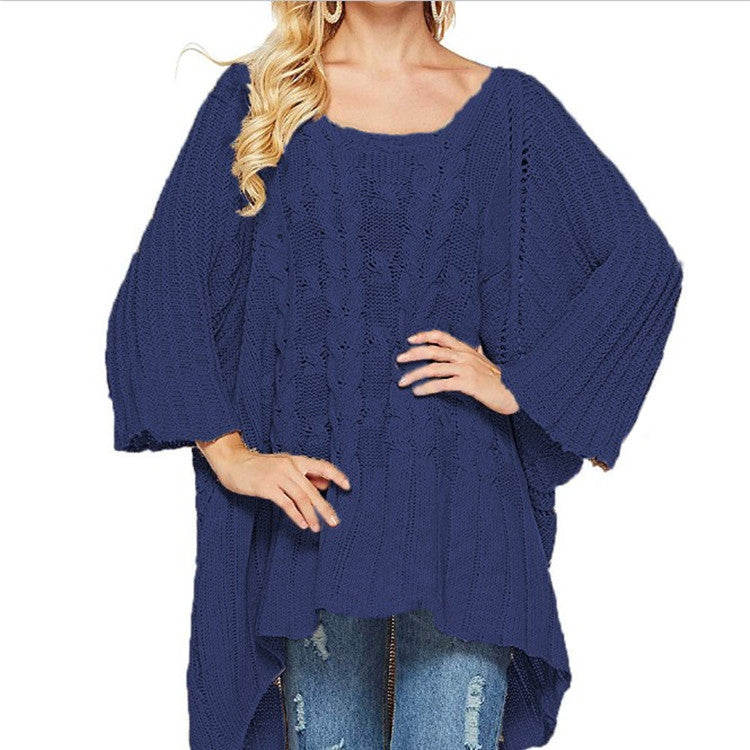 Women's chunky knit poncho with trendy cable pattern and wide sleeves Stilla