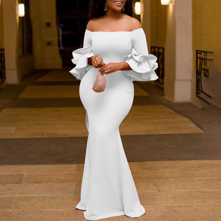 Dame Elegant aftenkjole med off-shoulder design og voluminøse ærmer Stilla