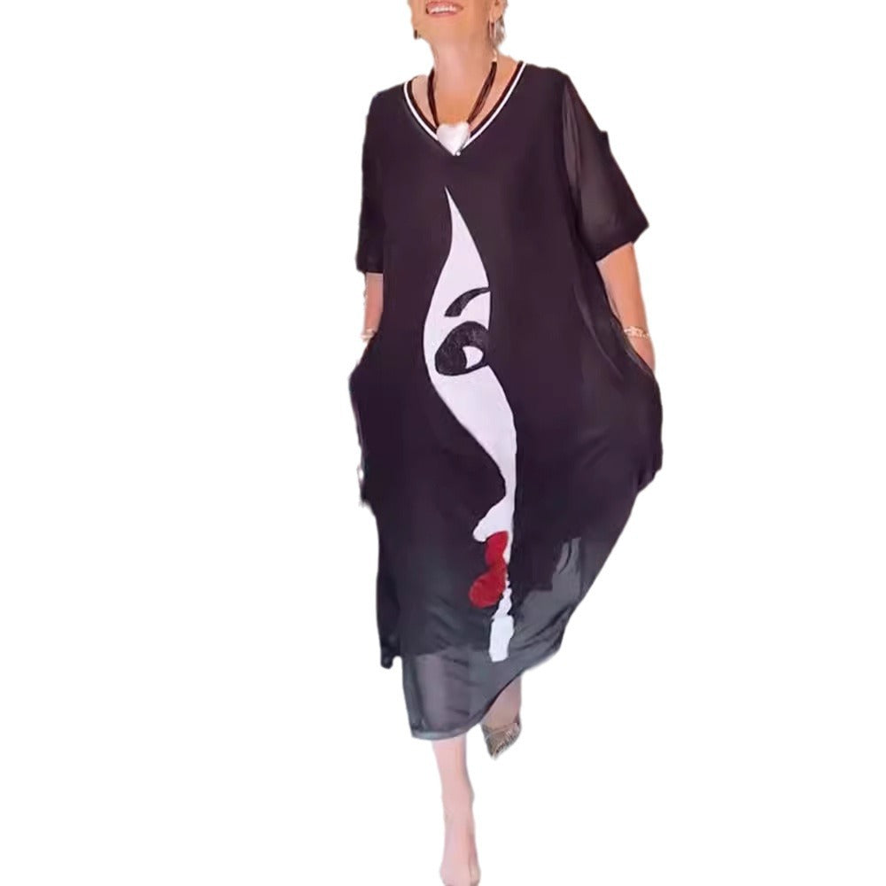 Dame nan lette chiffon maxikjole med grafisk ansigtstryk, V-hals og sidelommer Skovae