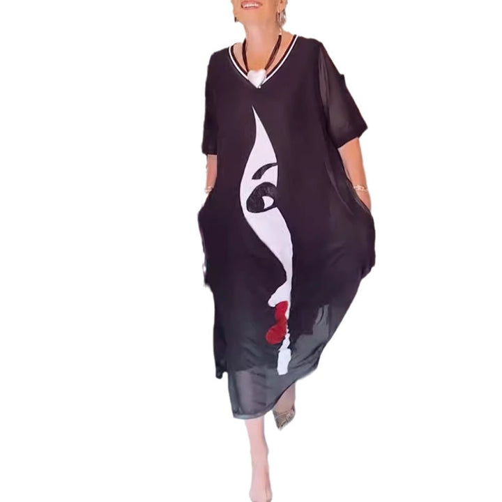 Dame nan lette chiffon maxikjole med grafisk ansigtstryk, V-hals og sidelommer Skovae