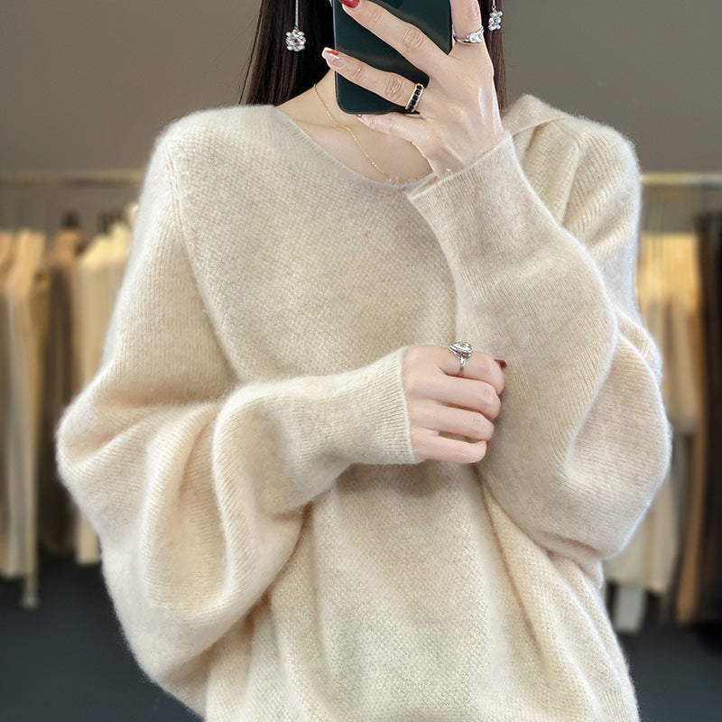 Kvinders afslappede sweater med voluminøse ærmer og V-hals Stilla