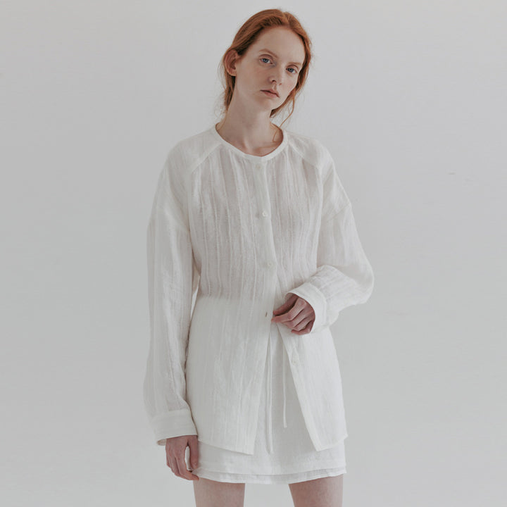 Dame Elegant og afslappet linnedbluse med knaplukning og struktureret design Stilla