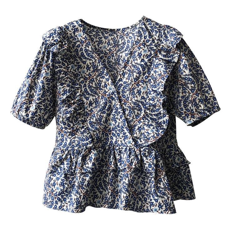 Dame omslagsbluse med flæse detaljer og blomstrede mønstre Stilla