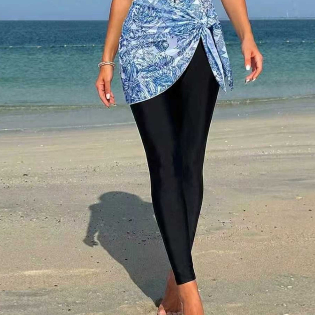 Damer sporty surfdragt med asymmetrisk snit og vildledetail Skovae