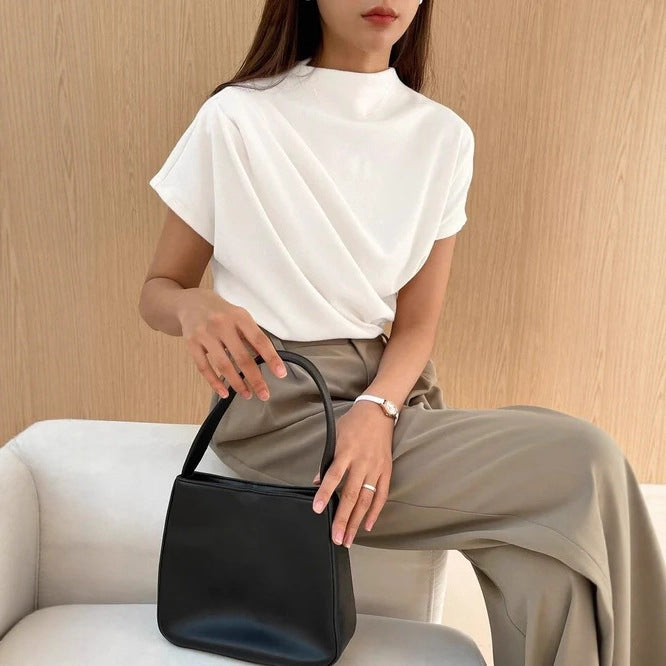 Dame Elegant og afslappet top med draperet design Skovae