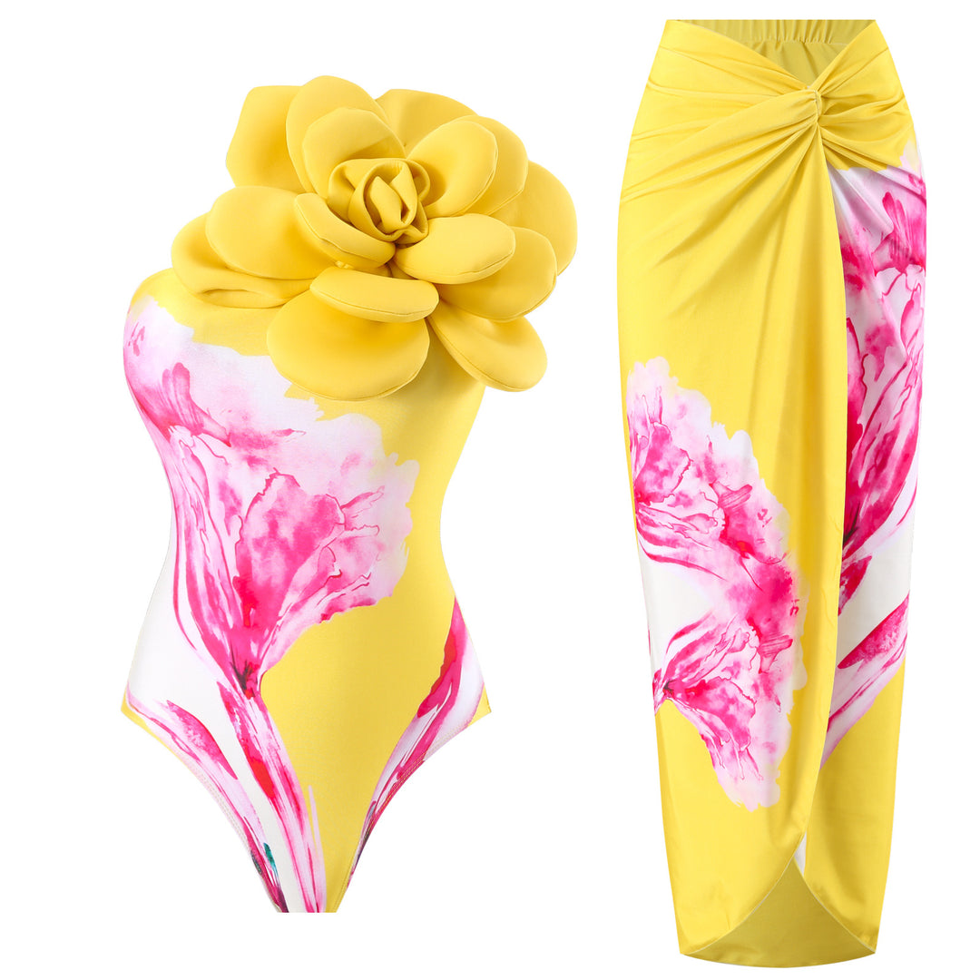 Dame badedragt med blomstret detalje og matchende sarong Stilla