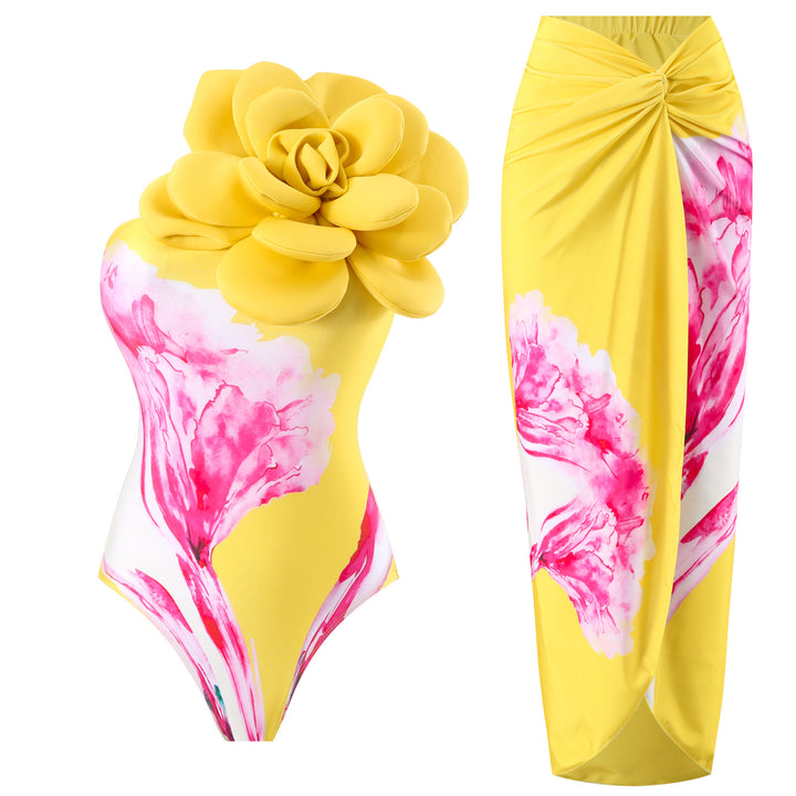 Dame badedragt med blomstret detalje og matchende sarong Stilla