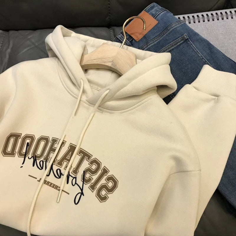 Kvinders hoodie med kreativ tekst og afslappet oversized pasform