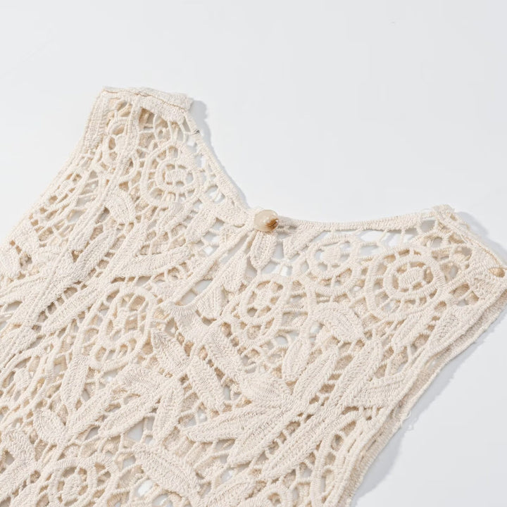 Dame spids blouse med asymmetrisk kant og florale mønstre Skovae
