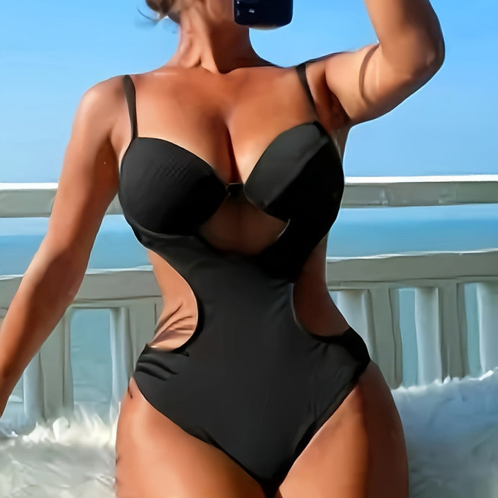Dame én-delt badedragt med elegant cut-out-design og justerbare stropper Skovae