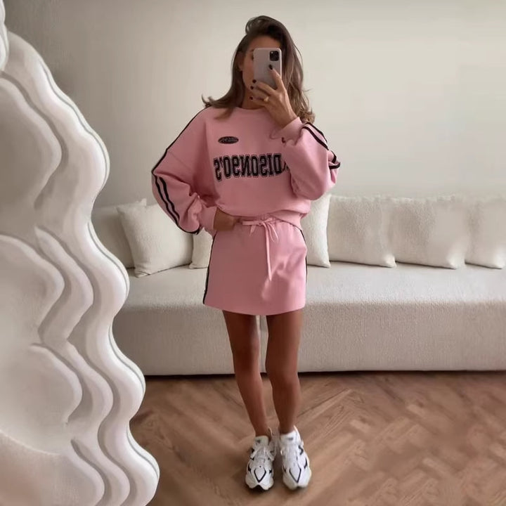 Dame sportkjole i sweatshirt-stil med snoretræk og lange ærmer