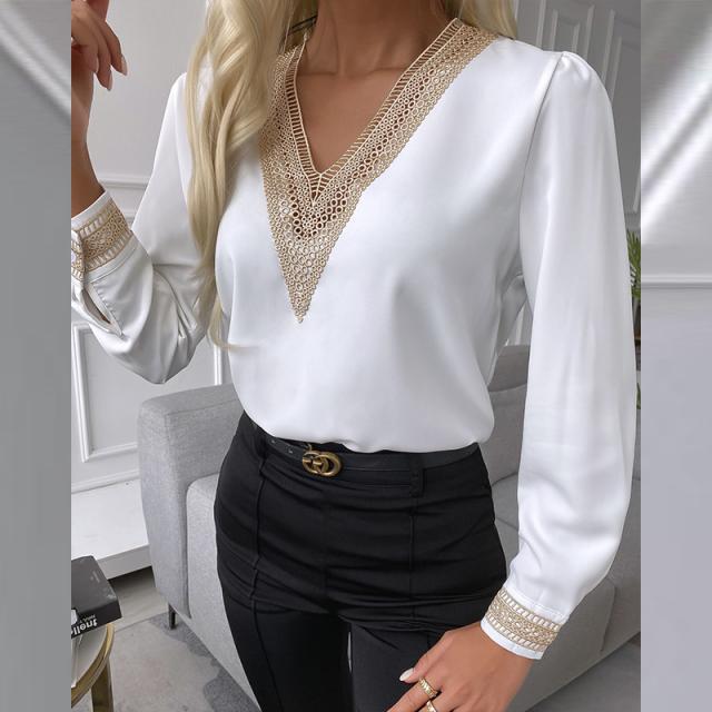Damebluse med elegant blonde og V-udskæring Stilla