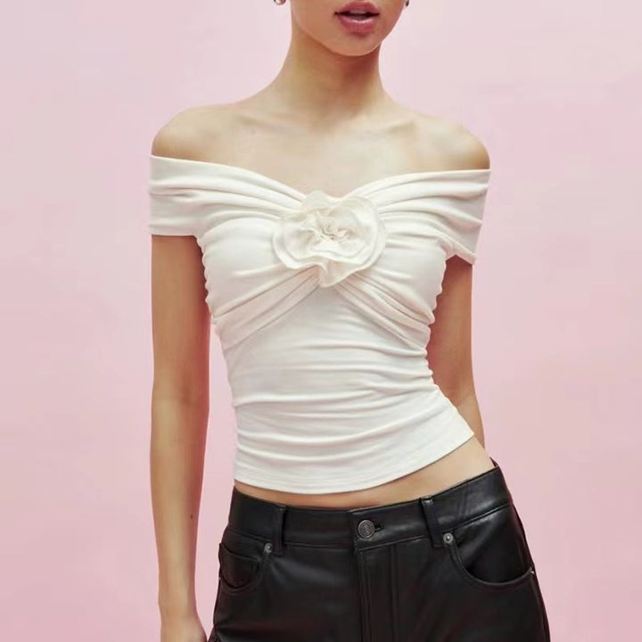 Dame Off-Shoulder Top med dekorativt indpakningsdetalje og florale accenter Stilla