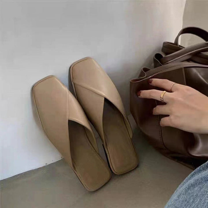 Dame Mules med elegant kryds-design og komfortabel fodseng Stilla