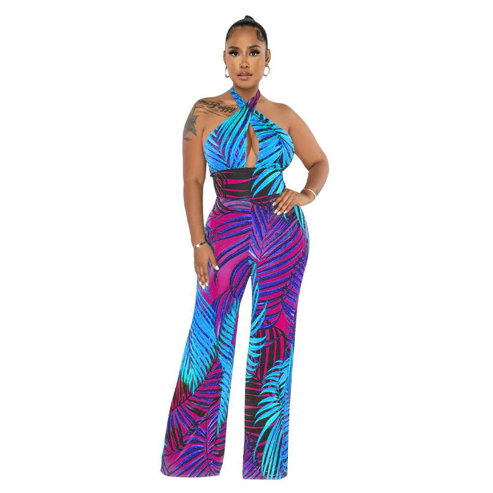 Dame elegant jumpsuit med afslappet halter-design og iøjnefaldende bladmønster Stilla