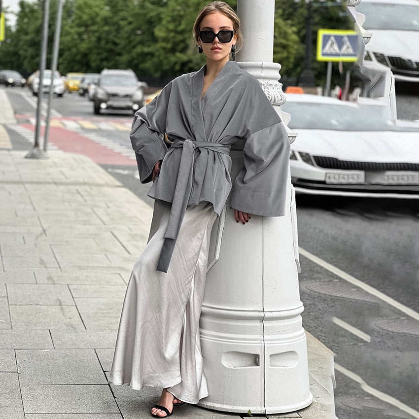 Dame fashionabel indpakningsjakke med bredt bælte og løs pasform Stilla