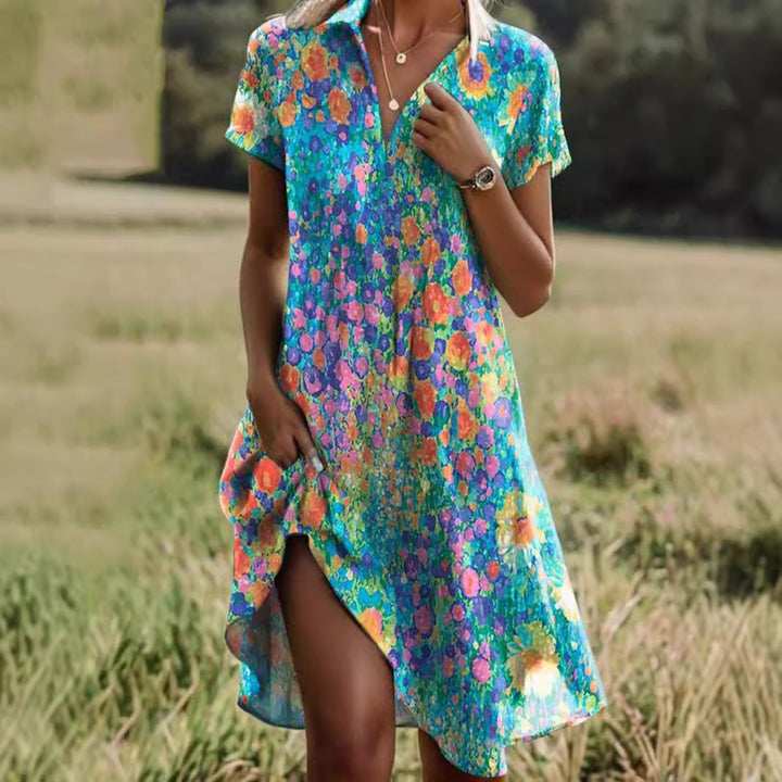 Dame skjortekjole med floral design og smart slidse Stilla