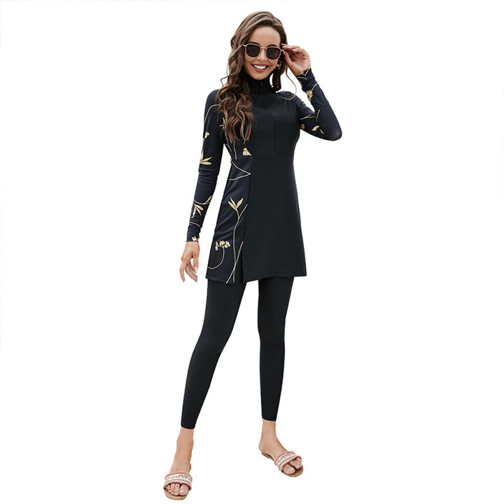 Dame Sporty Badedragt med elegant blomsterprint og lange ærmer Stilla