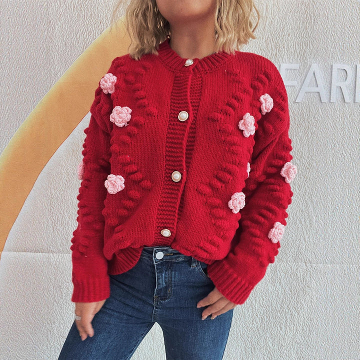 Dame cardigan med blomsterapplikationer og perleknapper Stilla