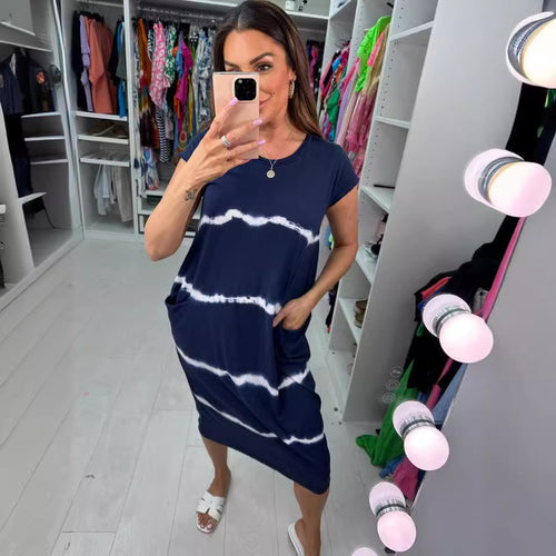 Dame fritidkjole med praktiske lommer og moderne batiklook Stilla
