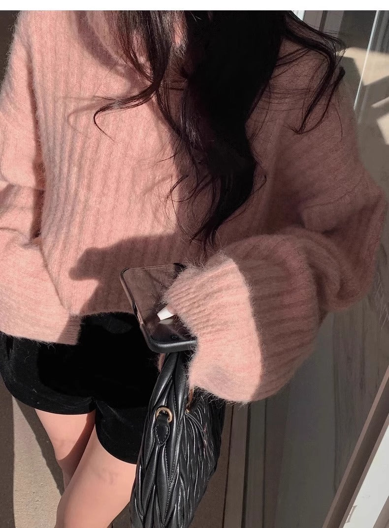 Damers fashionable rullehals sweater med ribstrikket struktur og løs pasform Stilla