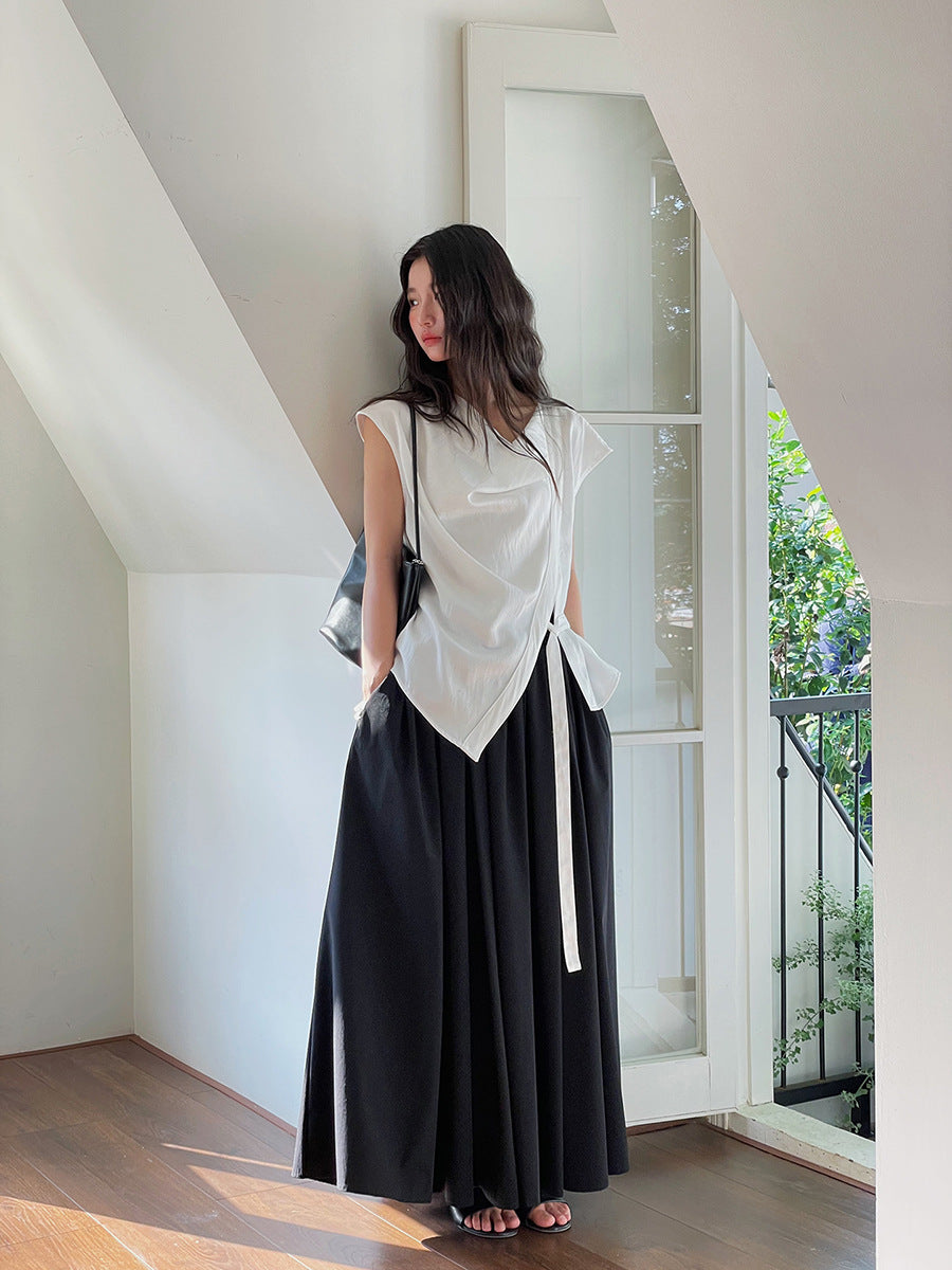 Dame indpakningsbluse med asymmetrisk snit og elegant drapering Stilla