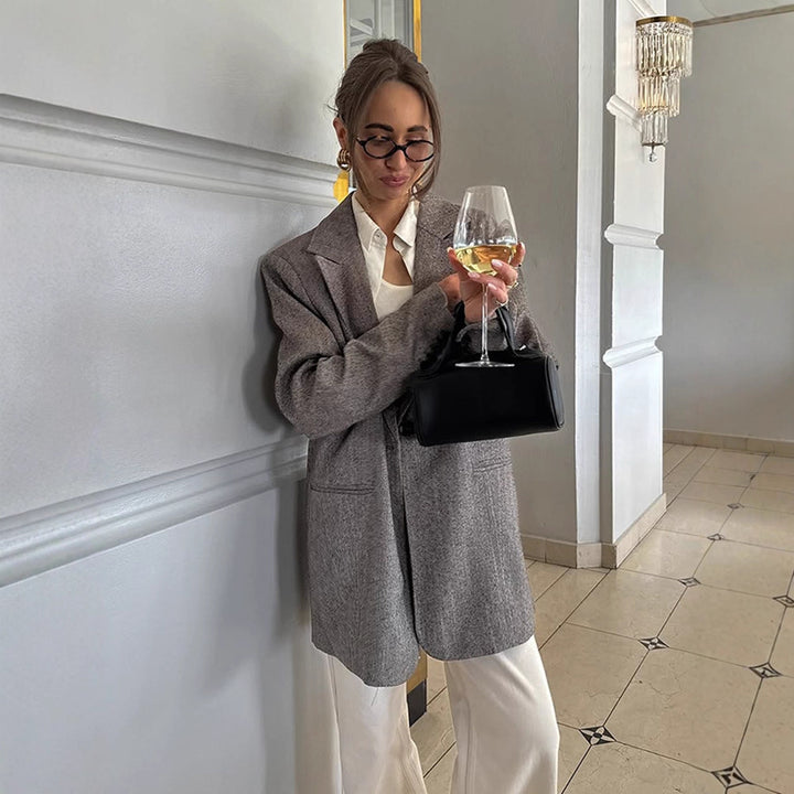 Dame Oversized Blazerjakke med elegant ternet mønster og praktiske lommer Stilla